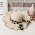 Cream-colored woven straw hat with wide wavy brim and leopard print ribbon bow - M (56-58cm) / Milk White
