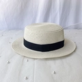 Elegant cream boater hat with black ribbon on white fabric with decorative pearls - M (56-58cm) / Milk White