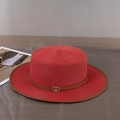 Detail of red flat top straw boater hat with brown leather trim and golden buckle - M (56-58cm) / Red