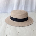 Detail of beige straw boater hat with black grosgrain ribbon on elegant white fabric - M (56-58cm) / Nude Pink
