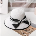 Elegant white straw sun hat featuring a black striped ribbon and large bow with letter M - M / Pure White