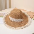 Close-up of hand-woven straw hat featuring delicate white lace trim and floral hollow design - M (56-58cm) / Khaki