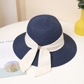 Navy blue woven straw sun hat with creamy ribbon and elegant rhinestone bow decoration - M / Navy Blue