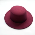 Elegant wine red wool felt boater hat with wide brim and decorative ribbon accent - Burgundy