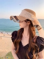 Detail of straw sun hat with lace ribbon, pearls and wavy mesh brim for women - M (56-58cm) / Khaki