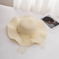 Close-up of cream straw hat with lace edges, pearl beads and yellow organza bow - M (56-58cm) / Milk White