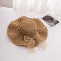 Detail of wide brim straw hat with elegant pearl beads and large sheer ribbon bow - M (56-58cm) / Khaki