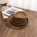 Detailed close-up of a woven coffee fedora hat with a brown leather belt and metal buckle - M (56-58cm) / Coffee