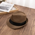 Detail of breathable brown straw fedora hat featuring a classic black satin ribbon band - L (58-60cm) / Coffee