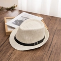 Dettaglio cappello in paglia intrecciata con fascia in pelle nera e fibbia argento - M(56-58cm) / Beige
