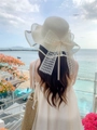 Women's cream straw hat with floral lace bow and elegant wavy brim for beach - M (56-58cm) / Milk White