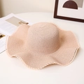 Detailed close-up of beige straw sun hat featuring elegant white lace on wavy wide brim - M (56-58cm) / Wavy Mesh - Pink