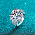 Luxurious S925 sterling silver flower ring with 10 carat moissanite on blue glitter - US 9 / 10ct Moissanite