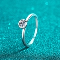 Minimalist S925 sterling silver moissanite ring with bezel setting on blue background - US 9 / 0.3 Carat Moissanite
