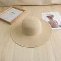 Beige woven straw sun hat with wide brim for DIY projects on rustic wooden floor - M (56-58cm) / Solid Edge Wide Brim - Beige