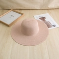 Pink wide brim straw sun hat with fine weave design on a minimalist wooden floor - M (56-58cm) / Solid Edge Wide Brim - Pink