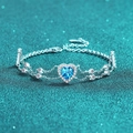 Elegante pulsera de doble capa de plata S925 con moissanita de corazón azul y dijes redondos - 1 Quilate Moissanita Azul / Plata 925