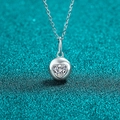 Polished S925 sterling silver heart moissanite necklace with spherical pendant on a teal background - 925 Silver / 0.5ct Moissanite