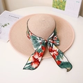 Detail of wide brim straw hat featuring floral ribbon bow and tight weave texture - M (56-58cm) / Nude Pink