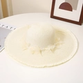 Detail of beige straw hat with delicate mesh flower decor and elegant pearl accents - M / Milk White