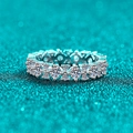 Elegant S925 sterling silver eternity ring featuring full moissanite stones in a pavé setting - US 9