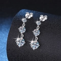 S925 sterling silver drop earrings with three graduated moissanite stones on black stand - 925 Silver / High Carbon Stone