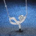 S925 silver bow pendant necklace with 1 carat pear-cut moissanite on dark blue background - 925 Silver / High Carbon Stone