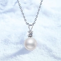 Elegante collana in argento s925 con perla d'acqua dolce tonda e pendente in moissanite - Argento 925 / Stile Moissanite e Perla