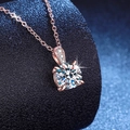 Elegant 1 carat Moissanite pendant necklace with four-prong setting and rose gold finish - 6.5mm High Carbon Stone / Rose Gold