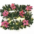 2.7m Christmas garland with pink poinsettias, rose gold balls and warm LED lights - Standard Pre-lit Style / Pink