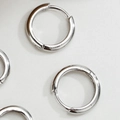 Polished S925 sterling silver hoop earrings with a hinged clicker in a minimalist style - 8mm Inner Diameter / White Gold