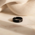 Detail shot of matte black stainless steel ring featuring flat top and beveled edges - US Size 7 (54mm) / Black