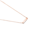 Macro shot of minimalist rose gold rectangular bar pendant necklace with thin cross chain - Rose Gold
