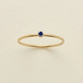 Minimalist gold thin ring with a small round blue zircon in a bezel setting - US 5 / September Sapphire Gold
