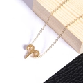 Aries zodiac necklace in gold finish with minimalist pendant on cross chain - Steel / Aries