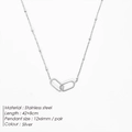 Detailed view of silver stainless steel necklace with interlocking oval rings and beads - Steel