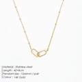 Detail showing 14K gold plated stainless steel paperclip chain with 12x6mm oval interlocking links - Gold