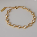 S925 Sterlingsilber vergoldetes Armband mit runden Zirkonia Steinen und Karabinerverschluss - 925er Silber / 18K-Gold