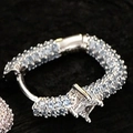 Silver S925 huggie earrings with rectangle center stone and pavé cubic zirconia - White Gold / Blue Zirconia Style (E6051)