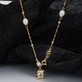 Collana in argento S925 con perle barocche e ciondolo in zircone, finitura dorata - Argento 925 / Oro 18K