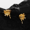 Boucles d'oreilles Saturne dorées avec pierre oeil de chat et détails de lave - Argent 925 / Or 18K