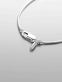 Detailed macro view of silver snake chain with polished lobster clasp and metal end cap - Octagonal Chain with Smooth Tag (YX44917) / 18K Gold