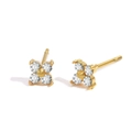 Close-up of four-leaf clover stud earrings with sparkling clear crystals in gold setting - April White (Diamond/Crystal Color)