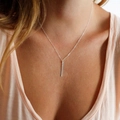 Minimalist silver vertical bar pendant necklace worn on neck by a model - Chain 42+8CM / 30*2MM Bar Steel Color (YX15474)