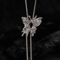 Silver butterfly bolo tie with textured wings and black gemstone on a snake chain - 925 Silver / White Gold