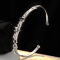 Retro S925 sterling silver open cuff bracelet with cat and star embossed design - 925 Silver / White Gold