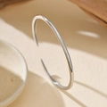 Minimalist S925 sterling silver open bangle with a polished silver-tone finish - 925 Silver / White Gold