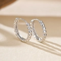 Classic S925 sterling silver hoop earrings with a continuous bubble bead design in silver - 925 Silver / White Gold