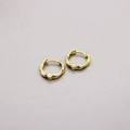 Pendientes de aro S925 plata de ley bañados en oro con textura de lava para unisex - Plata 925 / Dorado