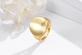 Macro detail of S925 sterling silver stamp on golden minimalist star ring band - Adjustable Open / Gold